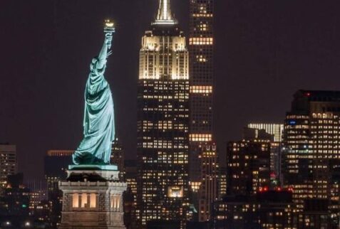 Statue of Liberty and Empire State Building NYC at night